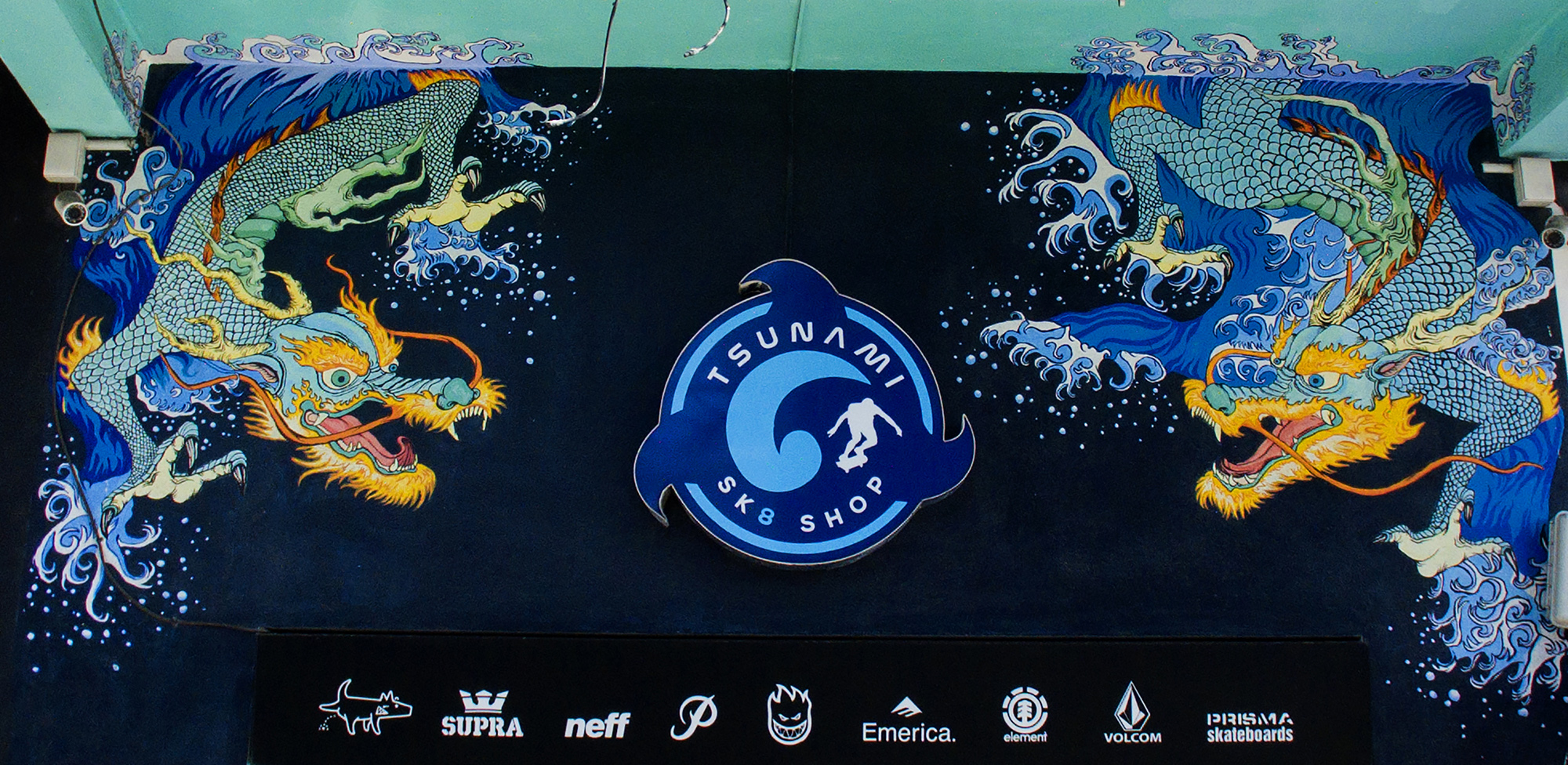 tsunami fachada dragones playa del carmen